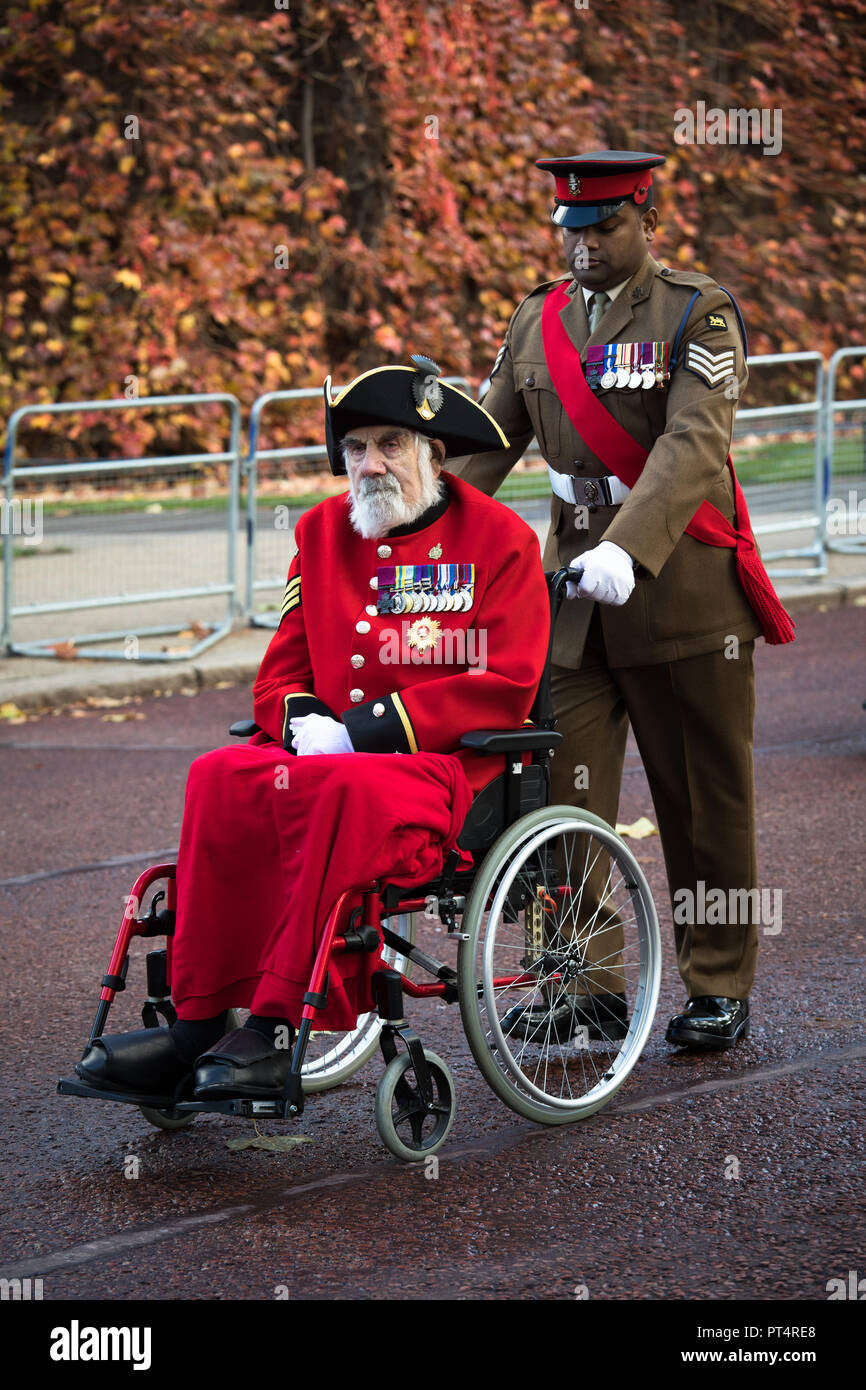 World War Two Veteran In Wheelchair Outdoors Wearing Cap Stock