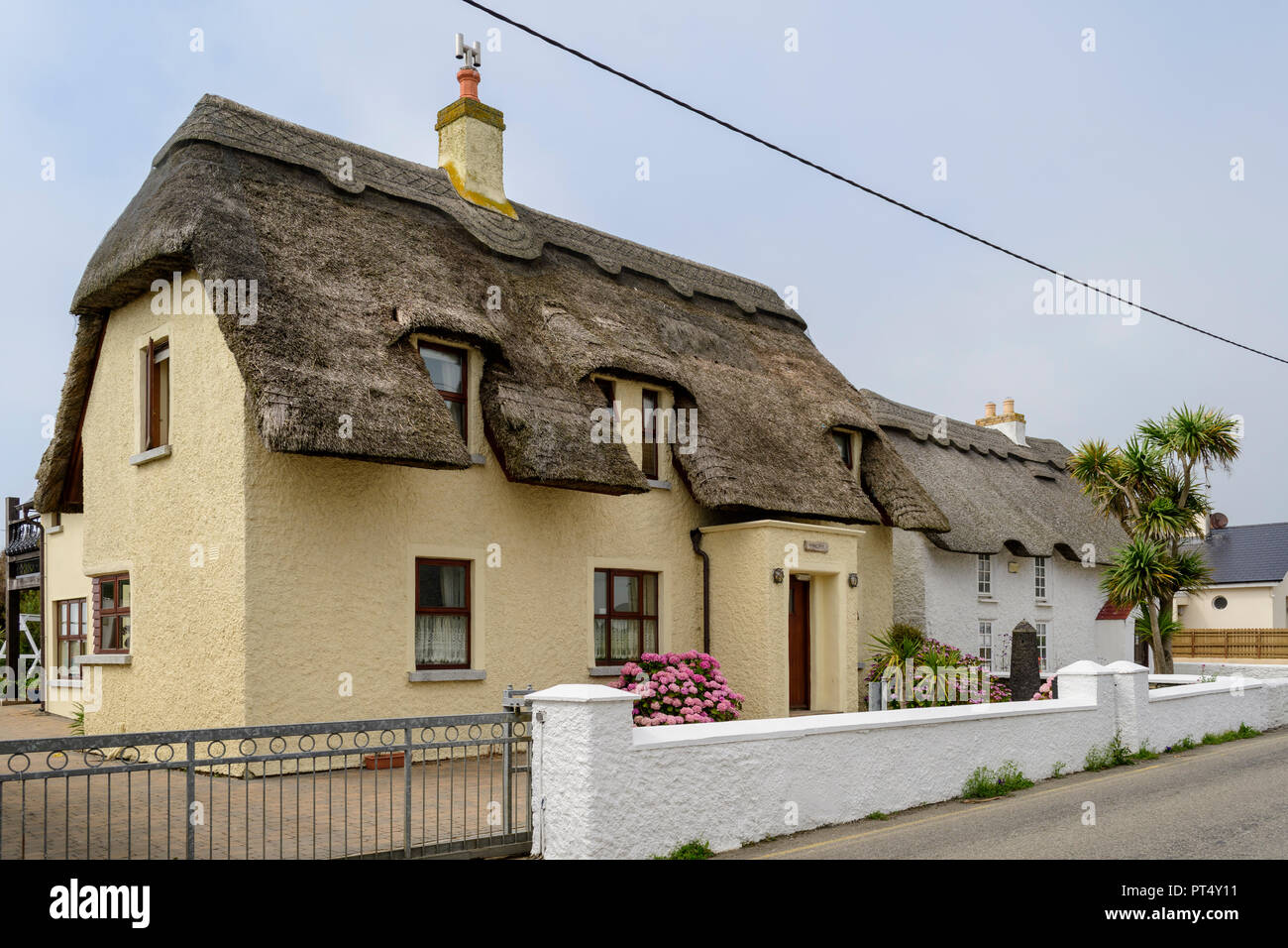 Thatched Cottages In Kilmore Quay Co Wexford Ireland Stock