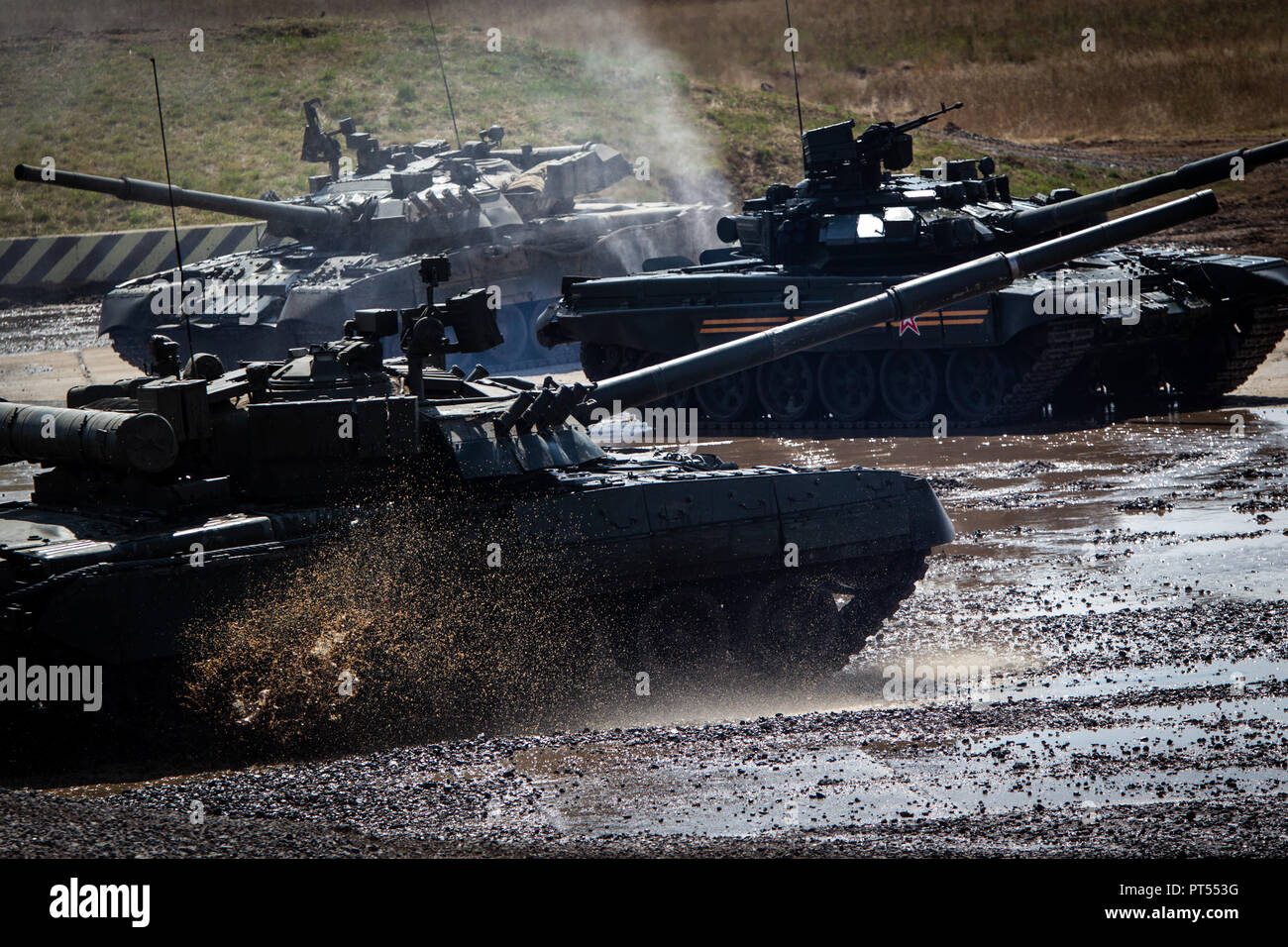 Zhukovsky, Russia. 11th Aug, 2014. Russian Army T-80 and T-90 tanks seen taking part in the tank show during the Engineering Technologies exhibition. Credit: Leonid Faerberg/SOPA Images/ZUMA Wire/Alamy Live News Stock Photo