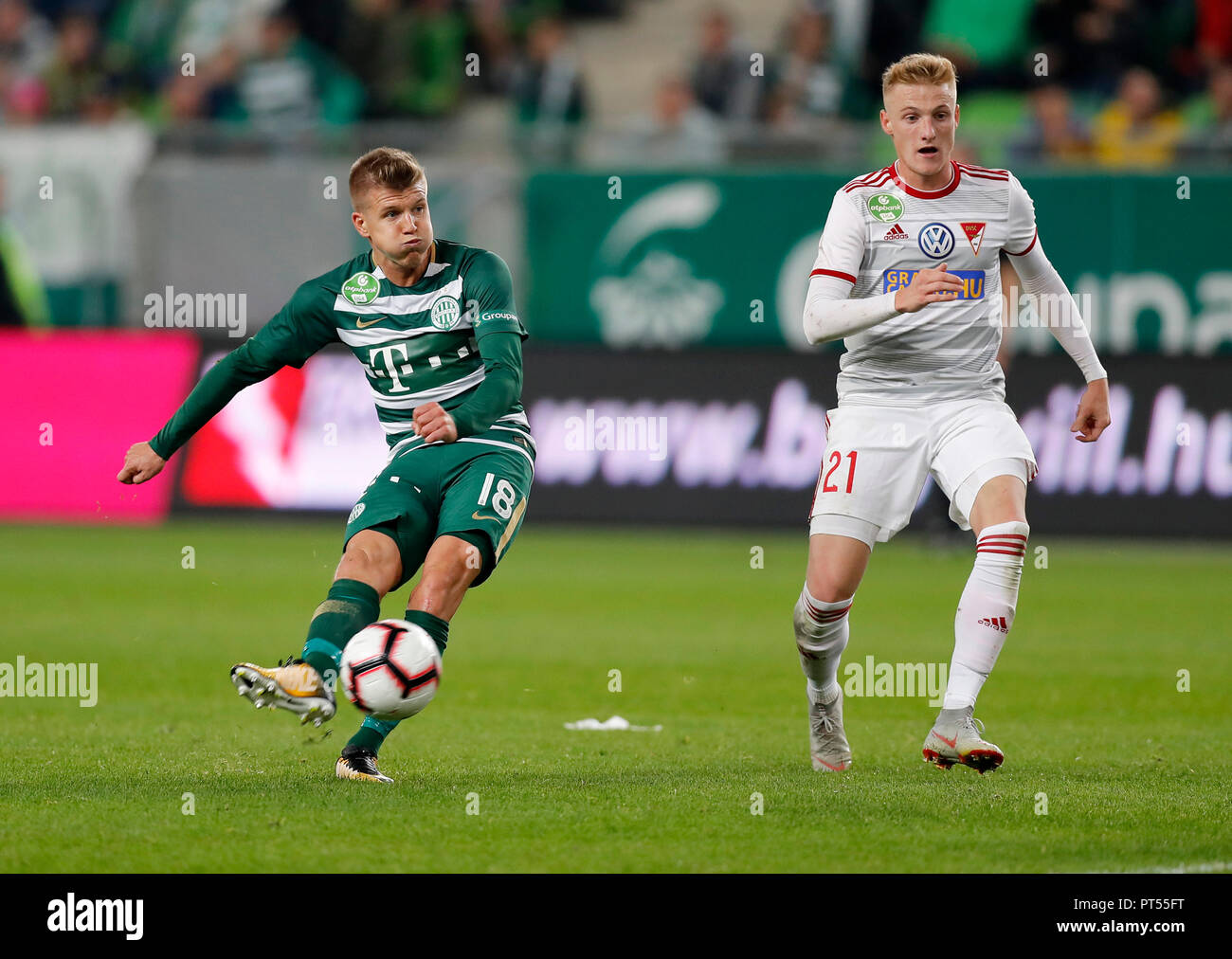 Budapest, Hungary. 2 September 2018. (l-r) Lukacs Bole of Ferencvarosi TC  covers the ball from Boban Nikolov of MOL Vidi FC during the Hungarian OTP  Bank Liga match between Ferencvarosi TC and