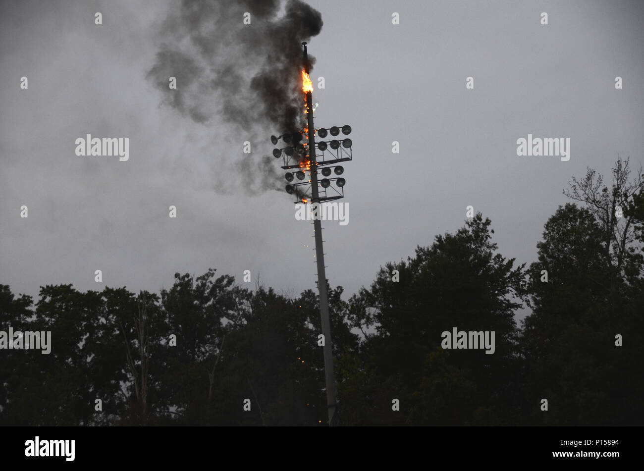 Waldorf, Maryland USA October5,2018  A high school soccer game was postponed after stadium lights that were lighting up the field at Weslake High School burst out in heavy smoke and fire during the game explosions from the lightpole sent both teams running off the field and canceling the game Stock Photo