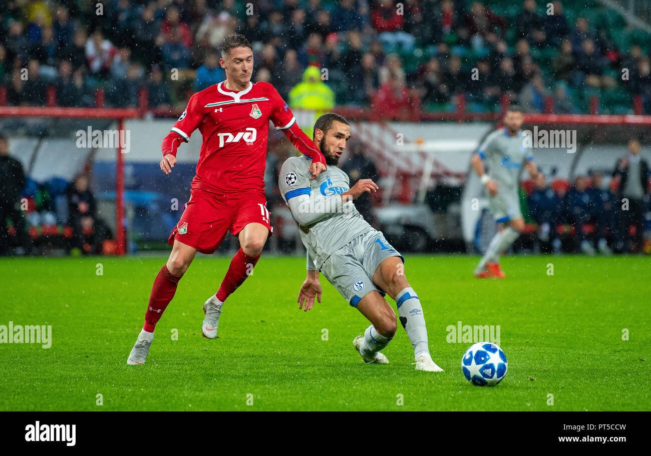 Moscow, Russia. 03rd Oct, 2018. Soccer: Champions League, Locomotive Moscow - FC Schalke 04, Group stage, Group D, 2nd matchday in Moscow. Schalke's Nabil Bentaleb (r) and Moscow's Anton Miranchuk fight for the ball. Credit: Guido Kirchner/dpa/Alamy Live News Stock Photo