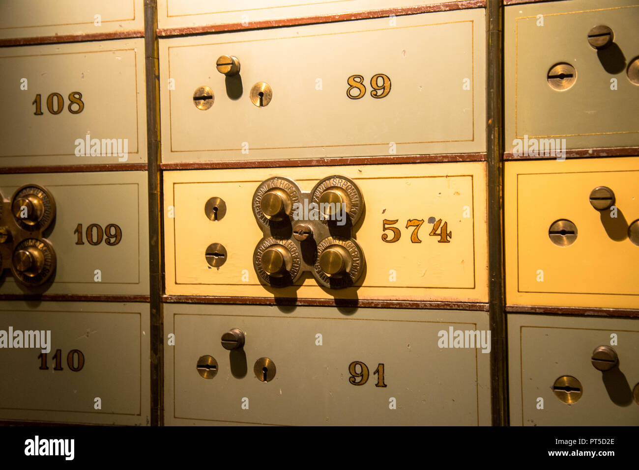 numbered old fashioned secure lockers at old bank building in Den Haag, Holland Stock Photo