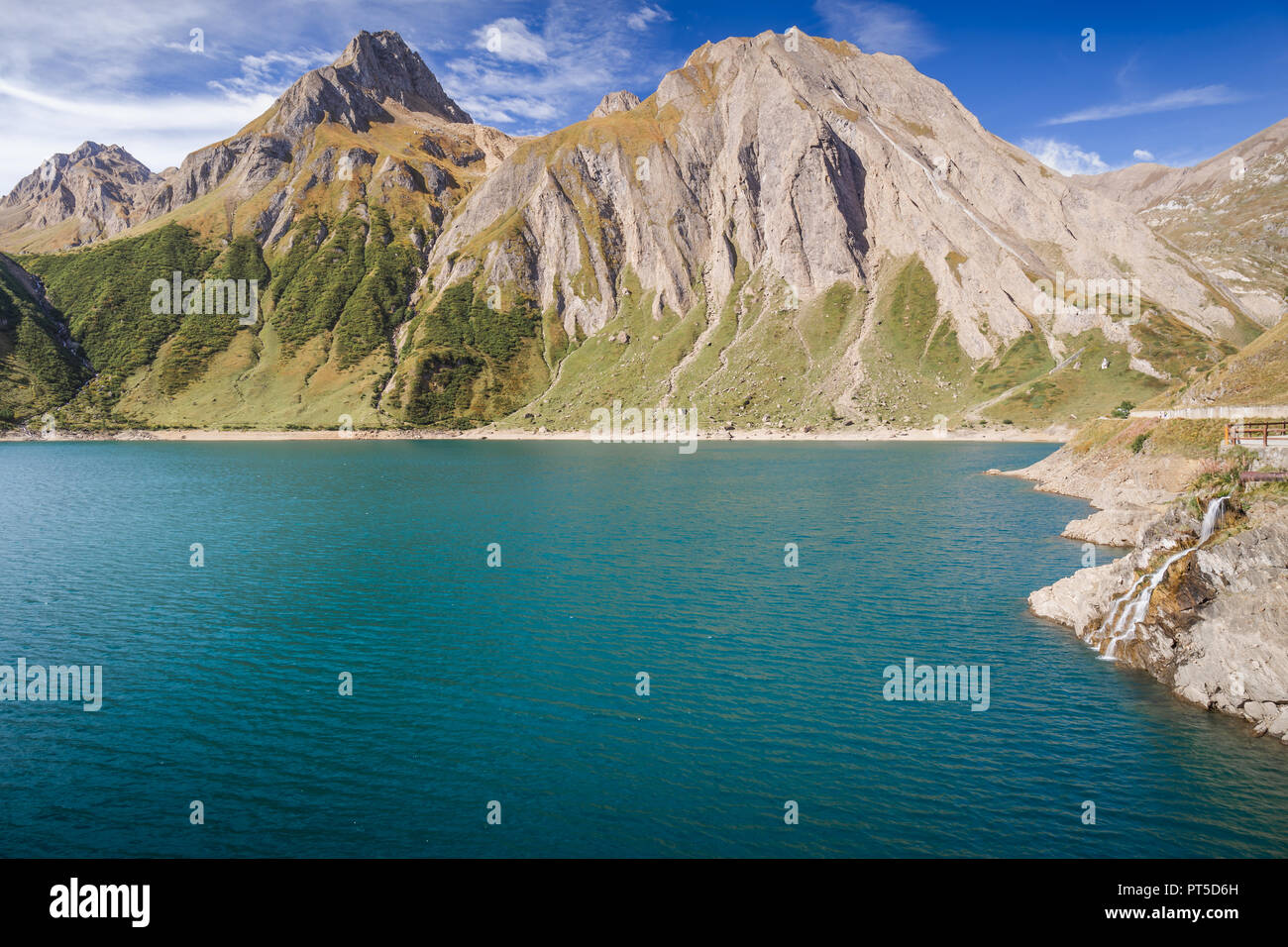 Dam and Lake of Morasco with great mountain on the background seen in a beautiful day of summer season, Riale - Formazza Valley, Piedmont, Italy Stock Photo