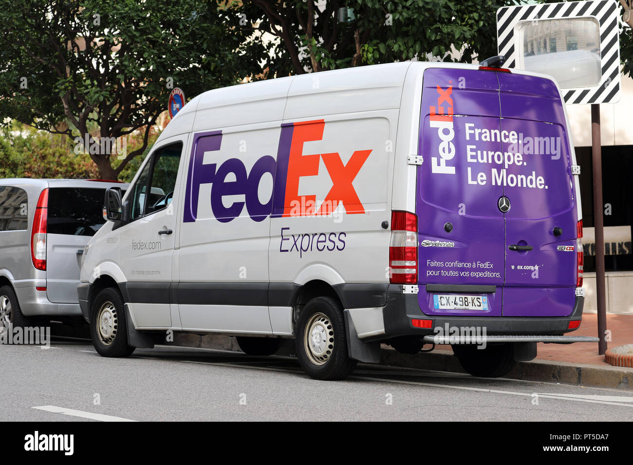 Monte-Carlo, Monaco - October 5 2018 : FedEx Delivery Truck (Van) Parked On The Street In Monaco. FedEx Corporation Is An American Multinational Couri Stock Photo