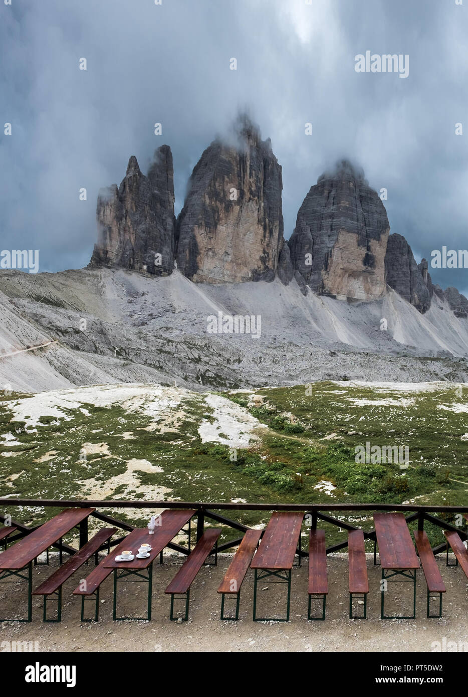 Coffee cups on a table with mighty Tre Cime peaks in the background Stock Photo