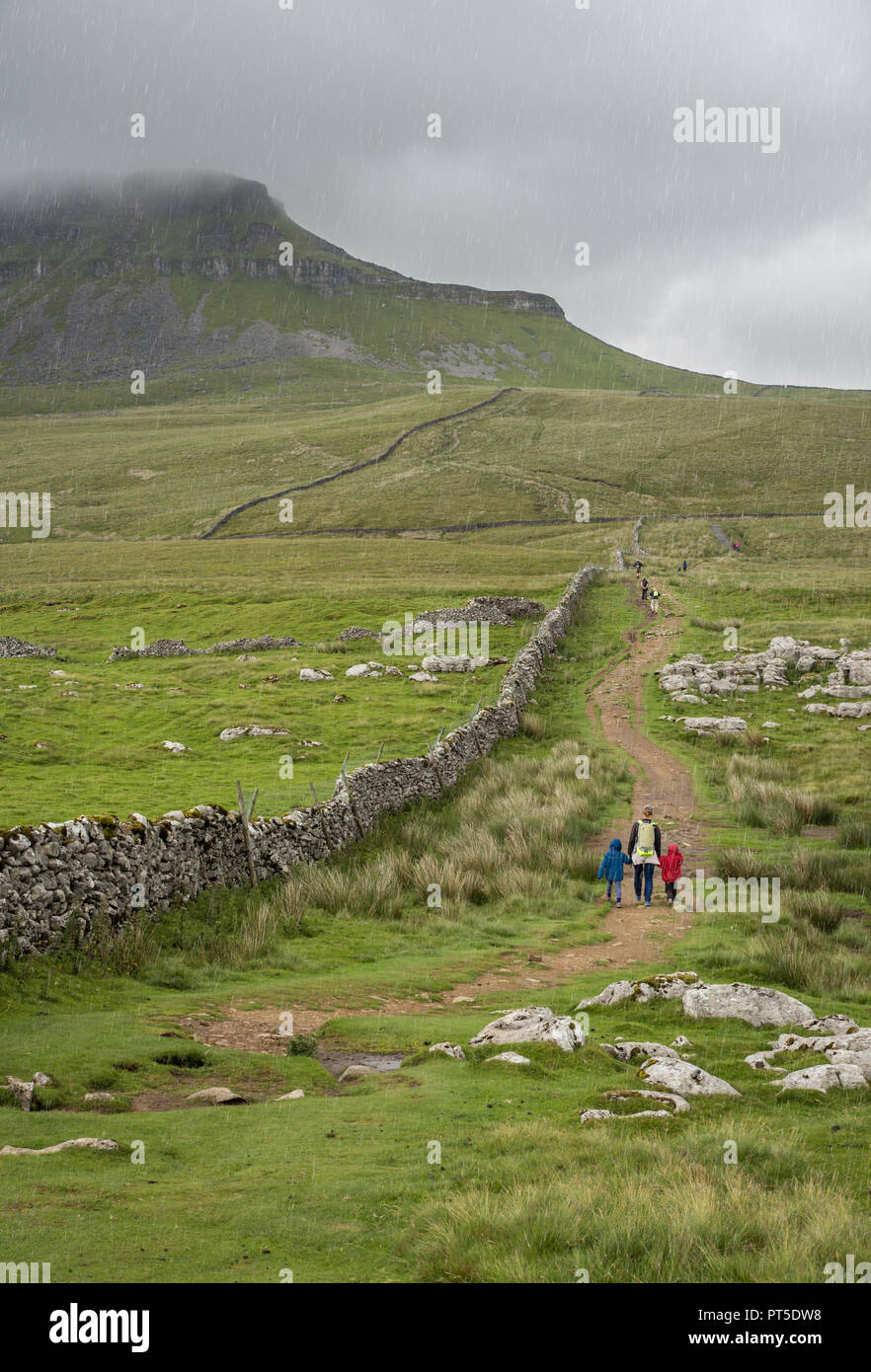 Foot path to Pen-y-Ghent on overcast day in North Yorkshire, England Stock Photo