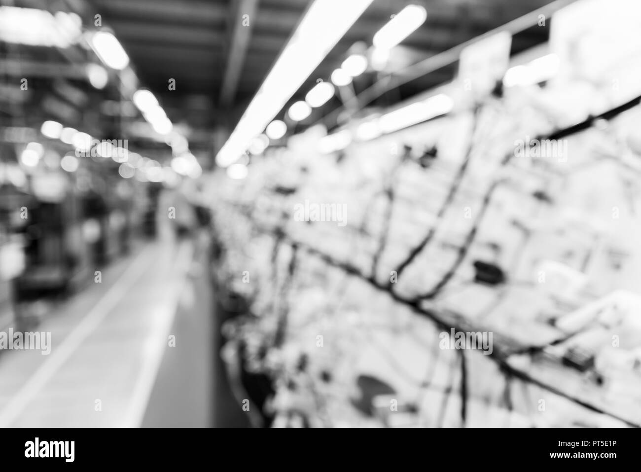 Abstract blurred manufacturing area at factory, background for industry, monochrome effect Stock Photo
