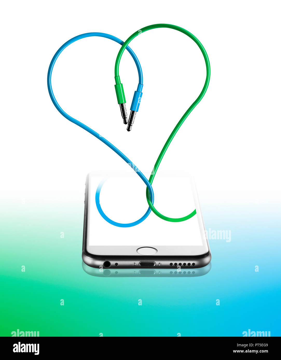Concept two wires forming a heart shape from an iPhone, 3D, Smartphone Blue Green Stock Photo