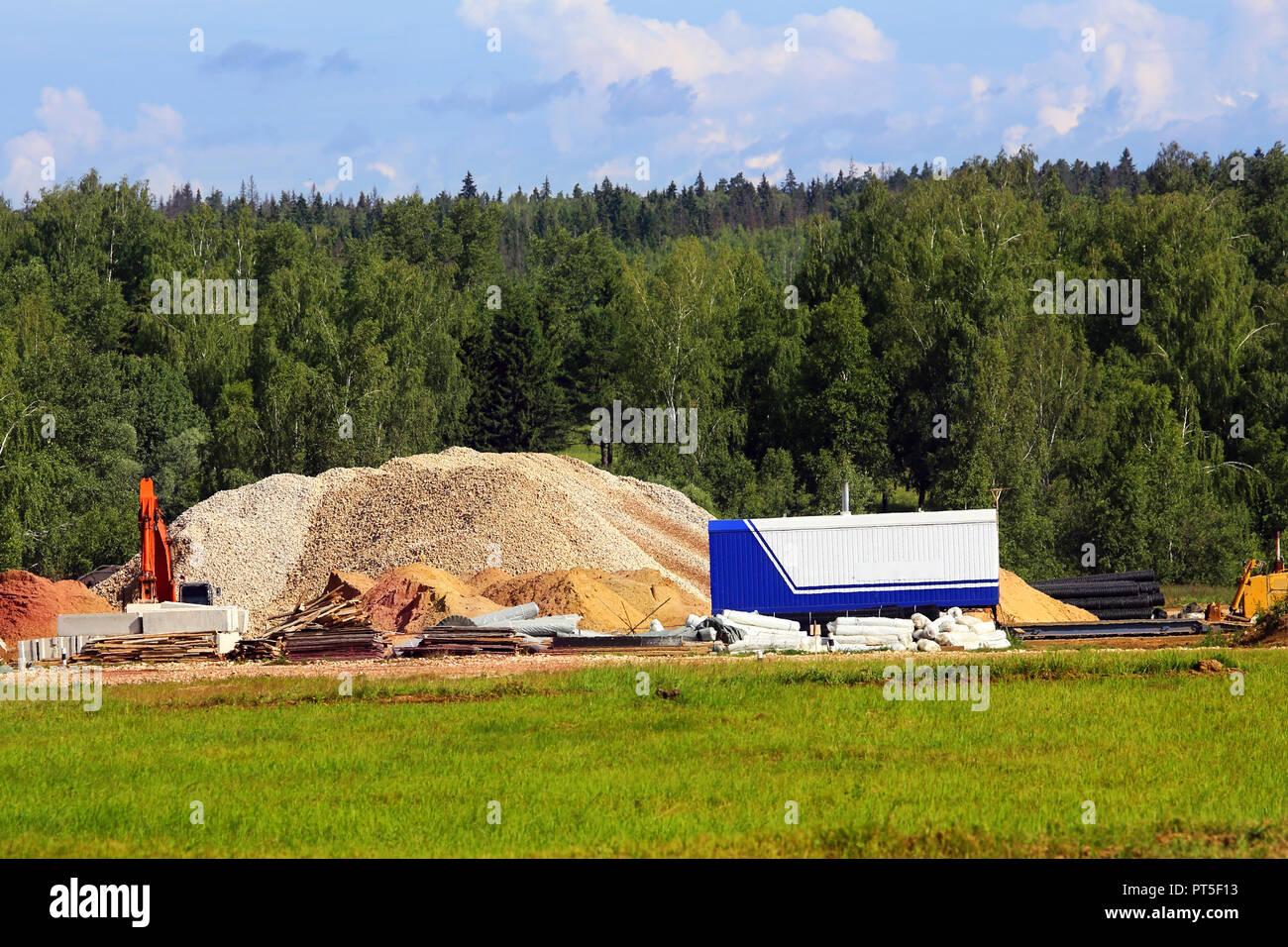 Building materials equipment and technics to start preliminary industrial construction works Stock Photo