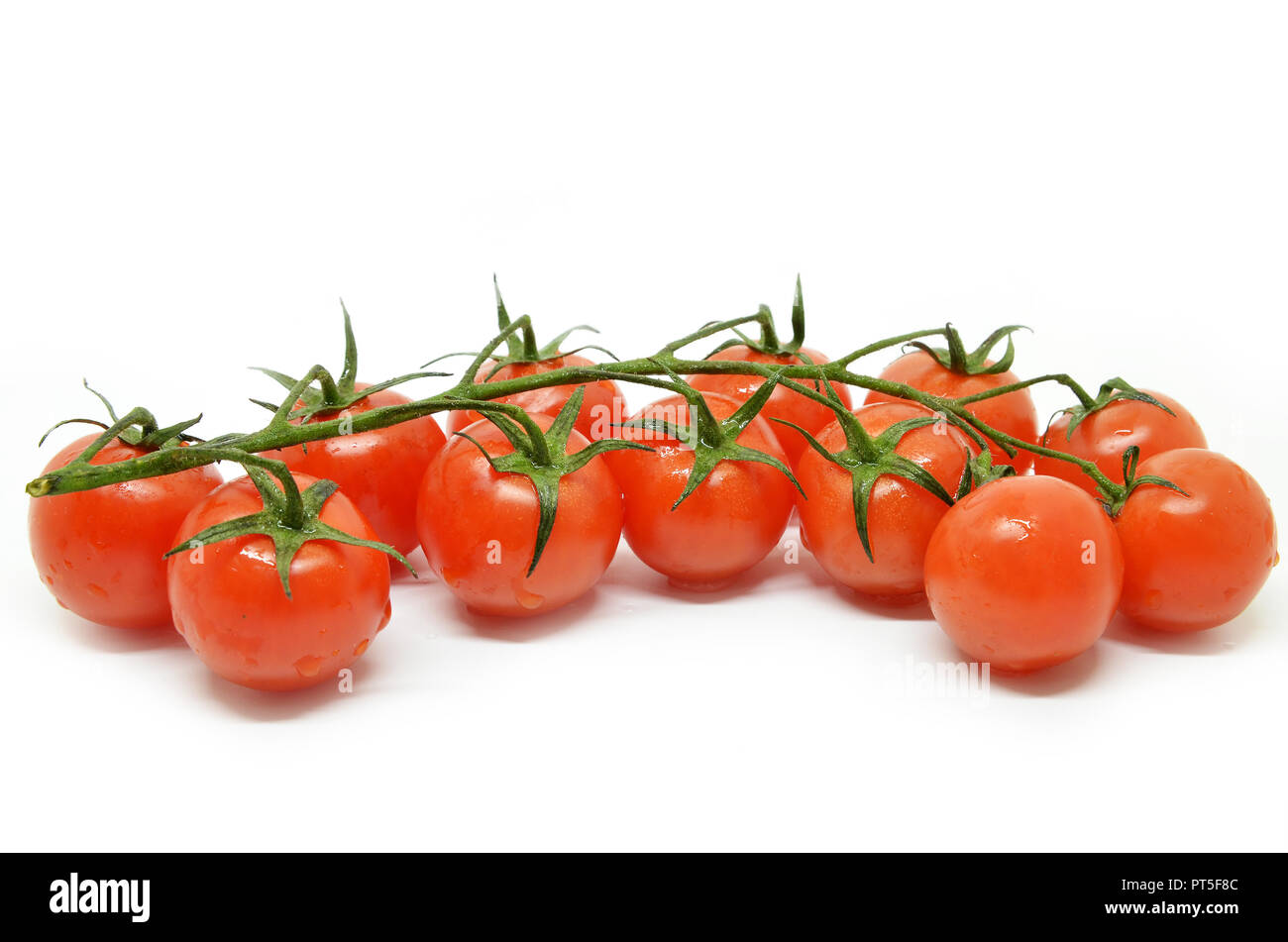 Red cherry tomato isolated on white background Stock Photo - Alamy