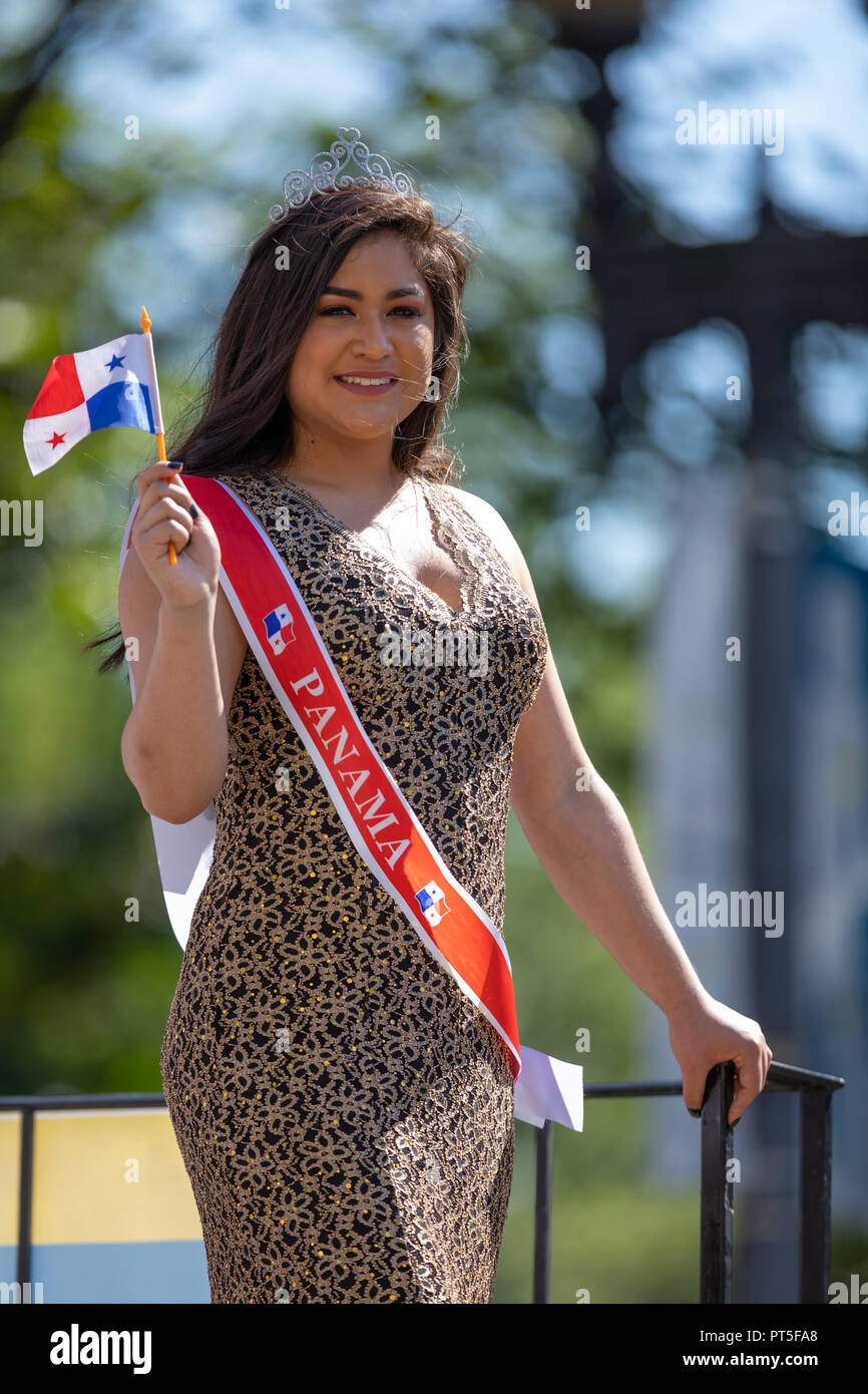 Washington, D.C., USA - September 29, 2018: The Fiesta DC Parade, Panamanian beauty queen Holding the panamanian flag going on top of a float down the Stock Photo