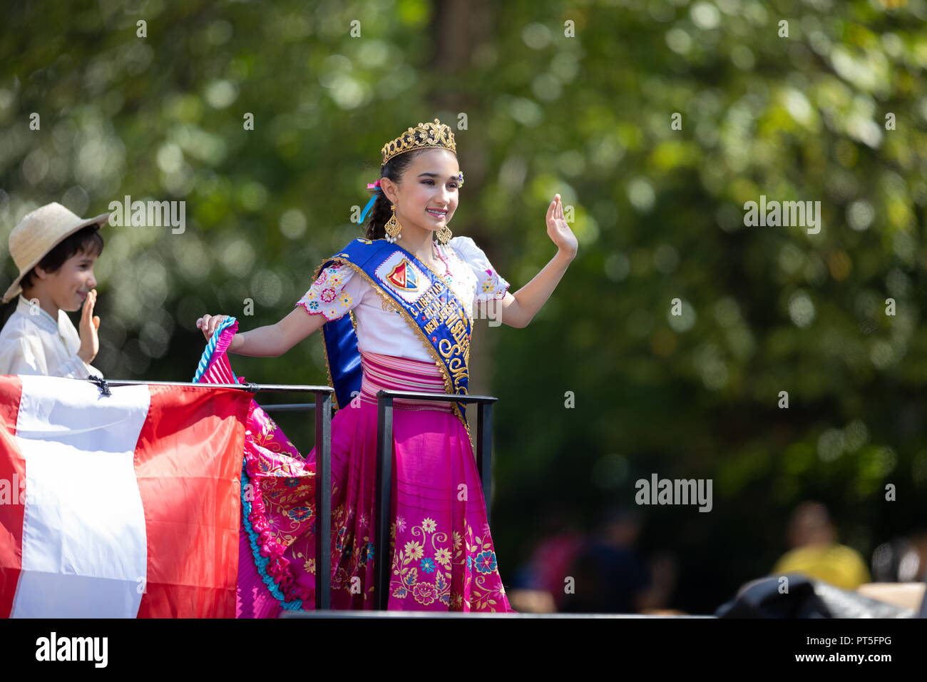 Washington, D.C., USA - September 29, 2018: The Fiesta DC Parade, Panamanian beauty queen wearing traditional clothing going on top of a float down th Stock Photo