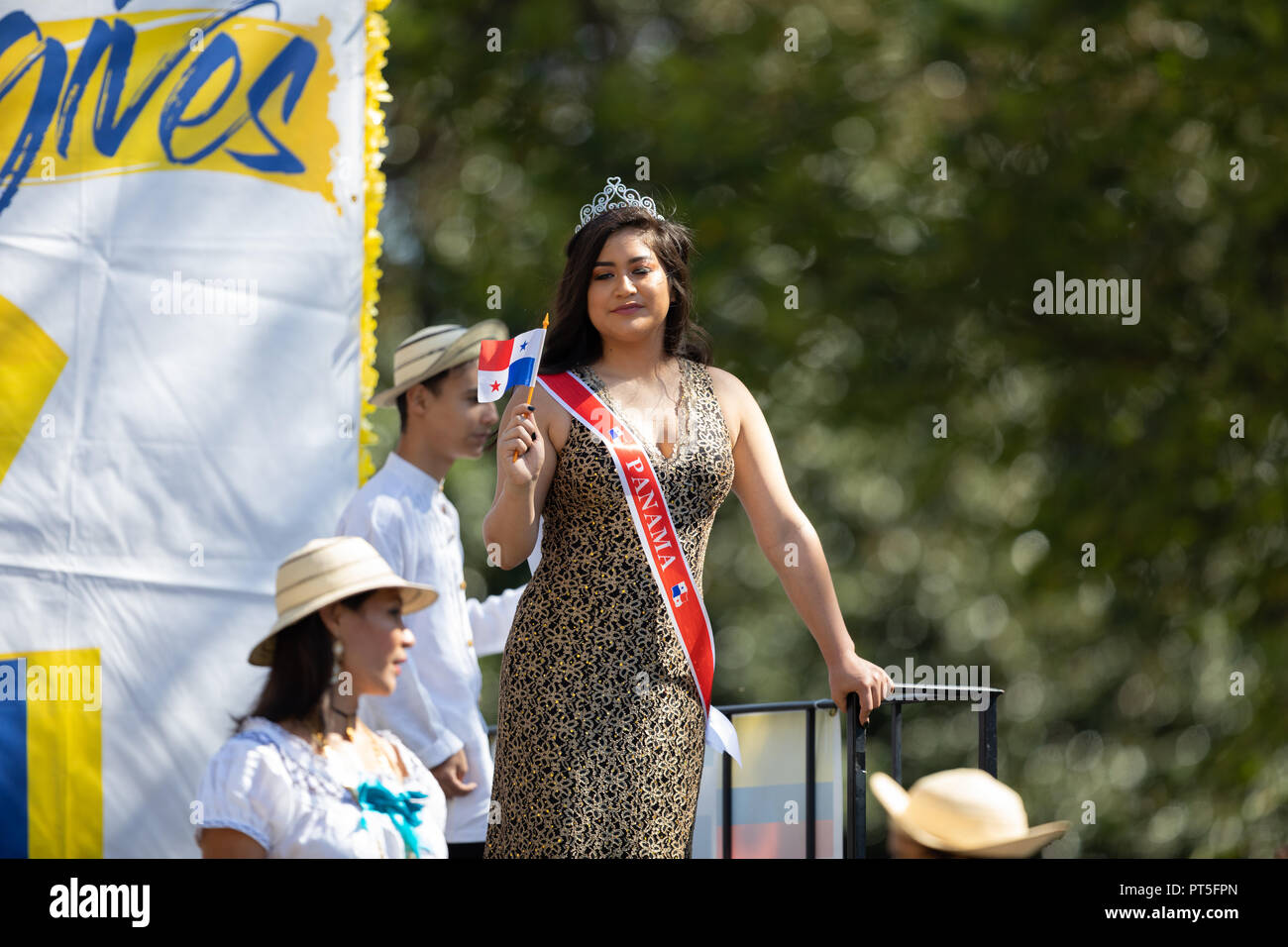 Washington, D.C., USA - September 29, 2018: The Fiesta DC Parade, Panamanian beauty queen Holding the panamanian flag going on top of a float down the Stock Photo