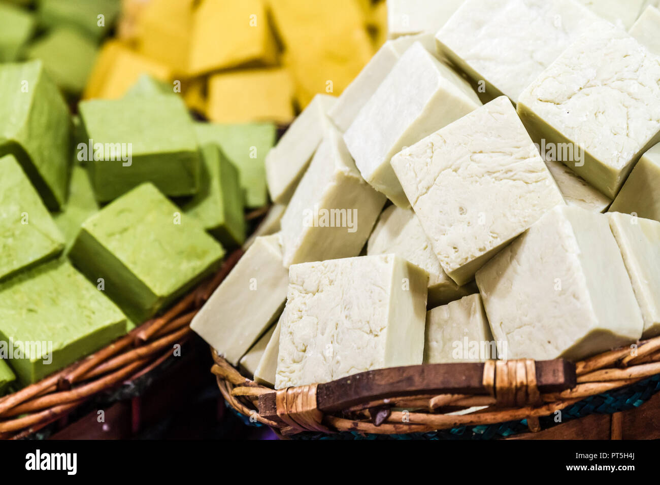 Home made natural soaps made from various raw vegetable oils Stock