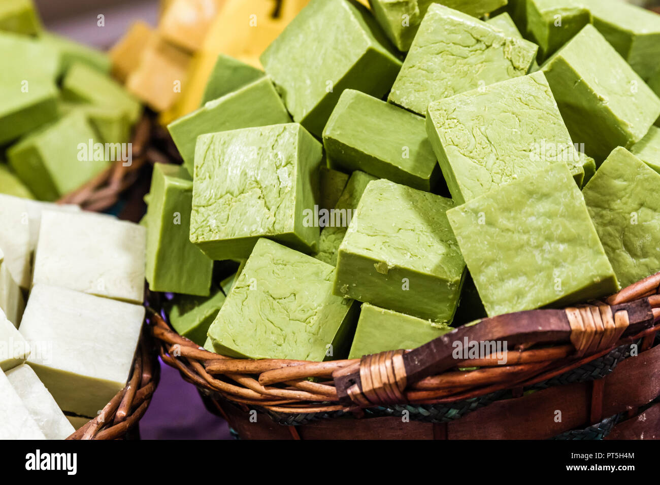 Home made natural soaps made from various raw vegetable oils Stock