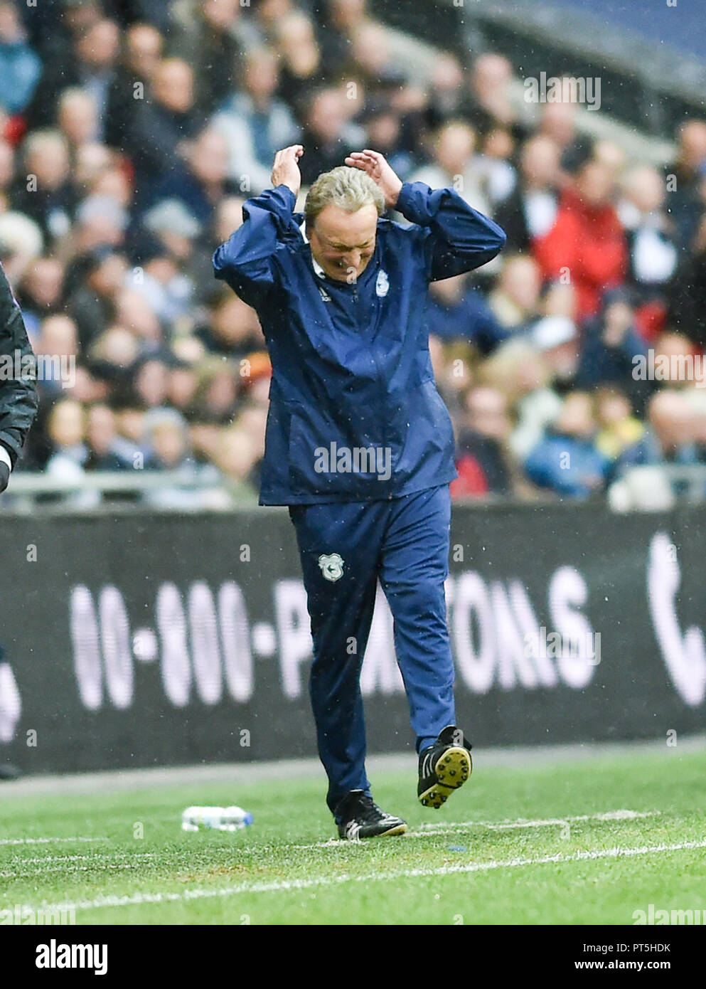 Cardiffs Manager  Neil Warnock shows his frustration during the Premier League match between Tottenham Hotspur and Cardiff City at Wembley Stadium , London , 06 October 2018 Editorial use only. No merchandising. For Football images FA and Premier League restrictions apply inc. no internet/mobile usage without FAPL license - for details contact Football Dataco Stock Photo
