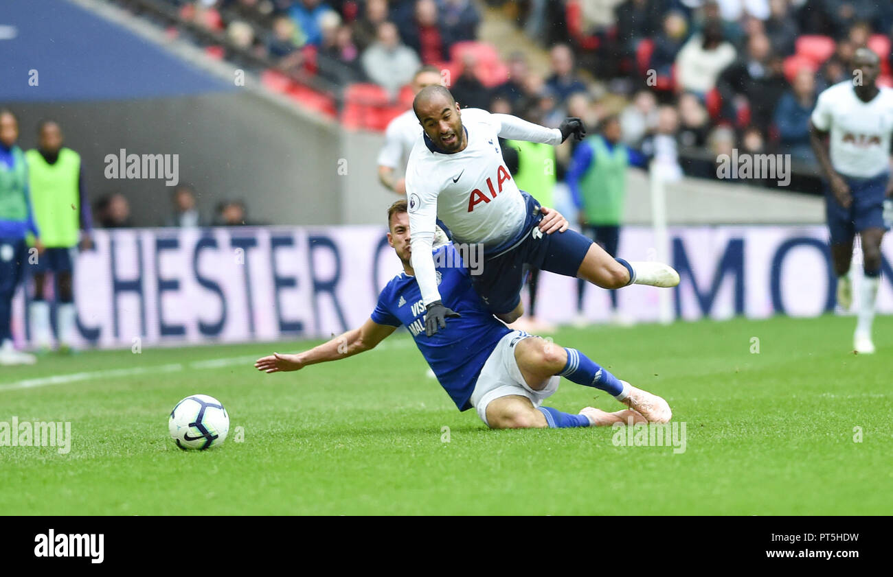 Lucas Moura of Spurs is fouled by Joe Ralls of Cardiff who was then sent off for the challenge in the second half during the Premier League match between Tottenham Hotspur and Cardiff City at Wembley Stadium , London , 06 October 2018 Editorial use only. No merchandising. For Football images FA and Premier League restrictions apply inc. no internet/mobile usage without FAPL license - for details contact Football Dataco Stock Photo