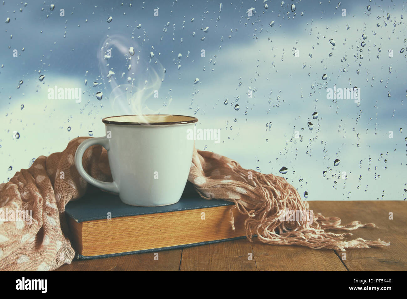 Coffee Cup On A Rainy Day Over Wooden Table And Window With Rain Drops Background Stock Photo Alamy