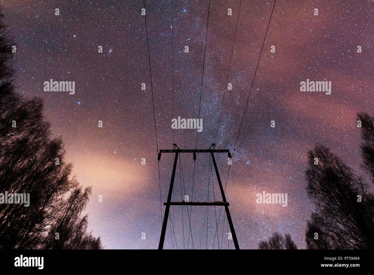 Power line under Milky Way and starry sky Stock Photo - Alamy