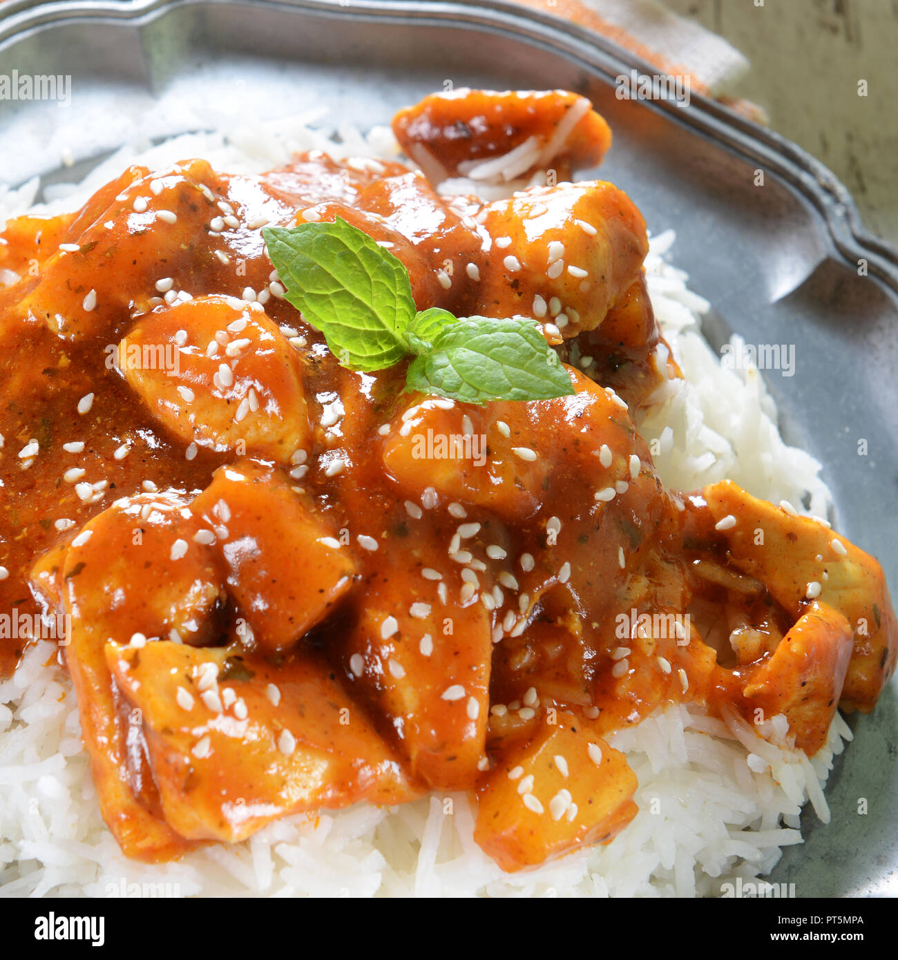 Chicken in caribbean style with pineapple and rice Stock Photo Alamy