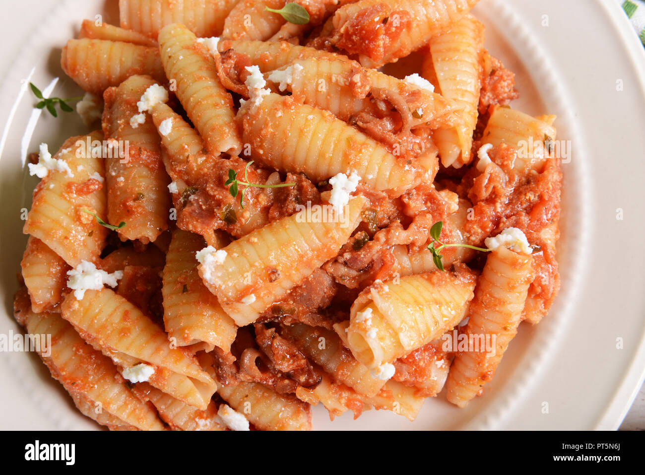 Pasta with ricotta sauce, tomatoes and ham Stock Photo Alamy