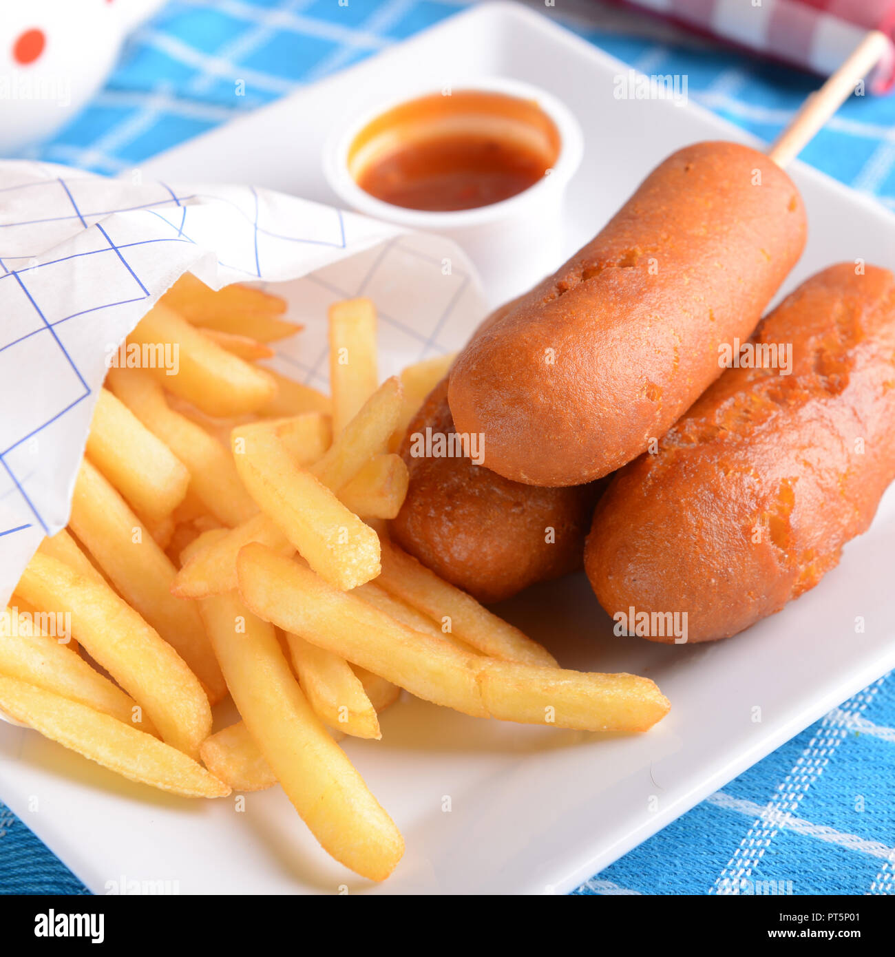 Corn dogs with fries Stock Photo Alamy