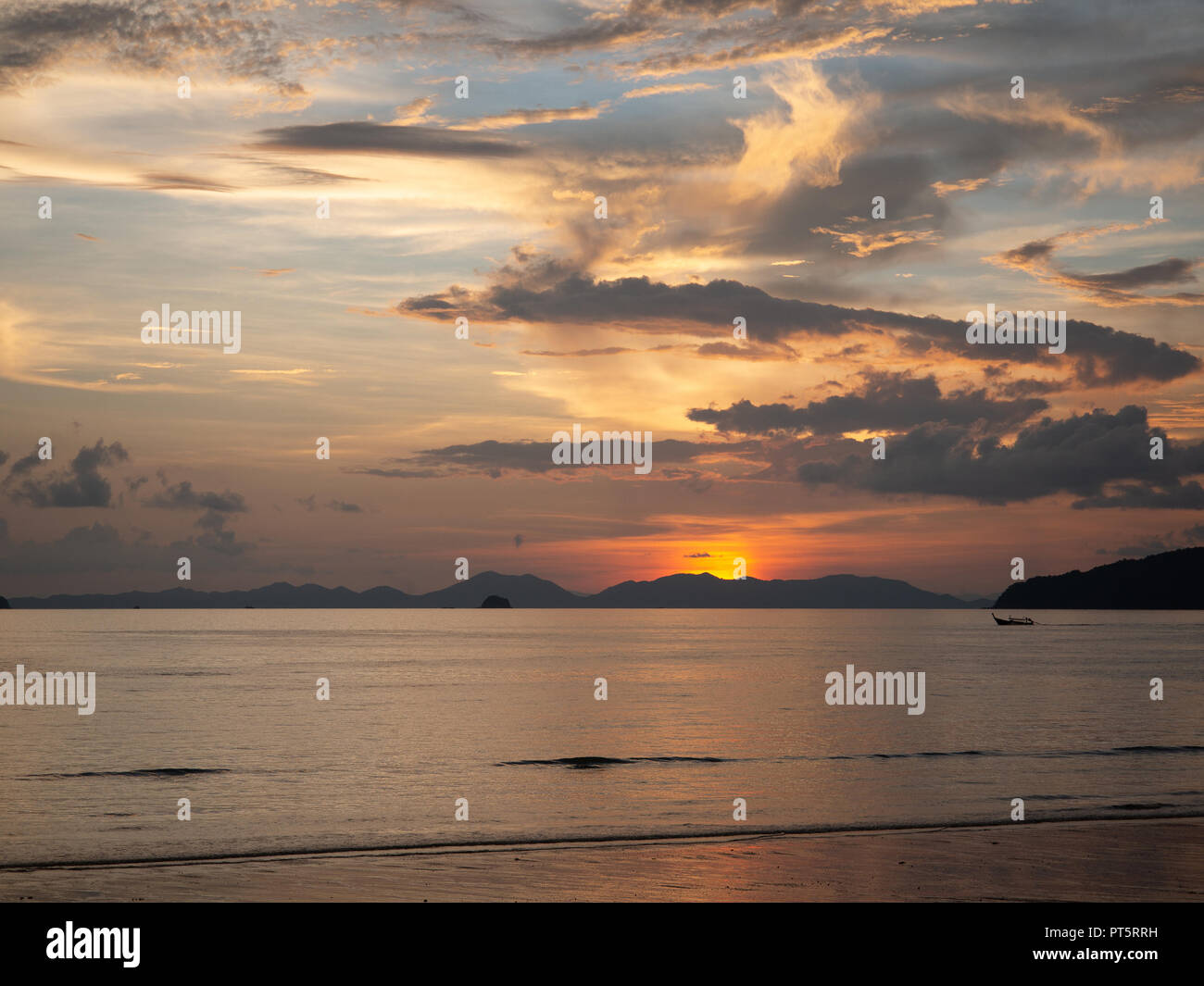 Amazing Sunset at the tropical beach Stock Photo - Alamy