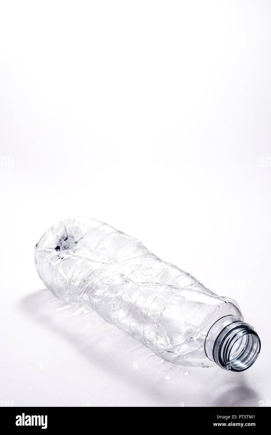 Empty plastic bottle, environmental issue. Plastic waste problem, reusable or disposable. Stock Photo