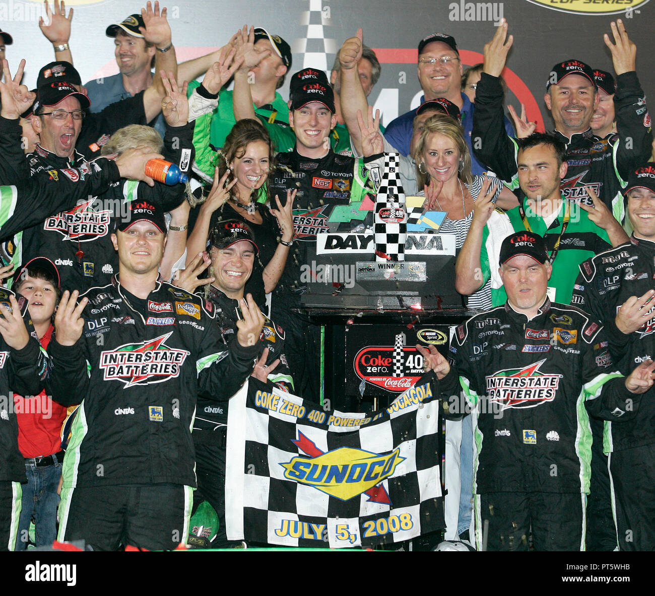 Kyle Busch celebrates winning the NASCAR Sprint Cup Coke Zero 400 at