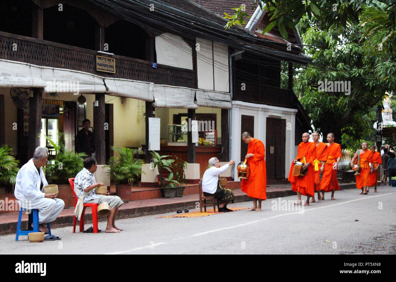 Monks accepting alms, Luang Prabang Stock Photo
