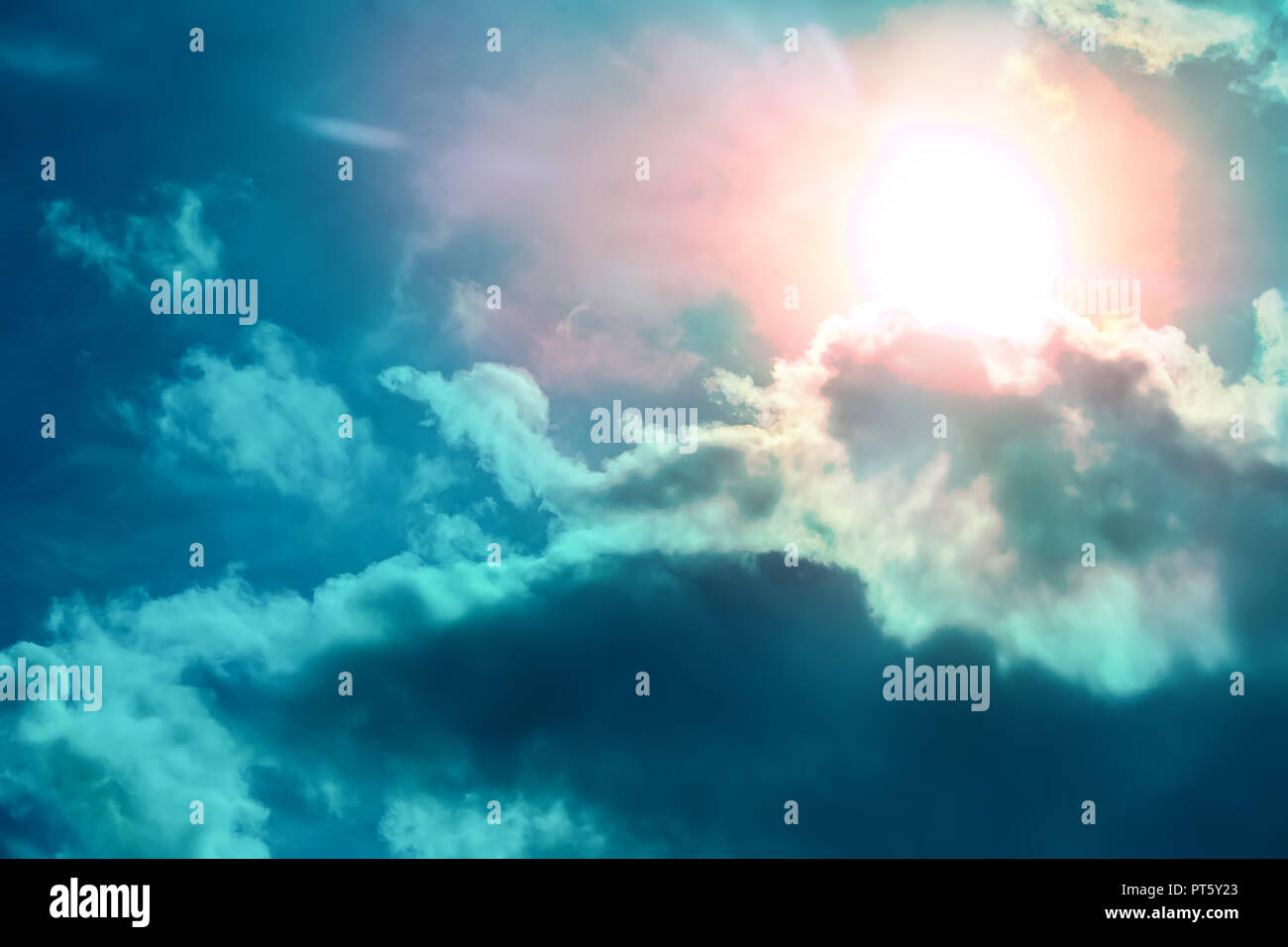 Beautiful Dark Sky with Sun and Clouds Stock Photo