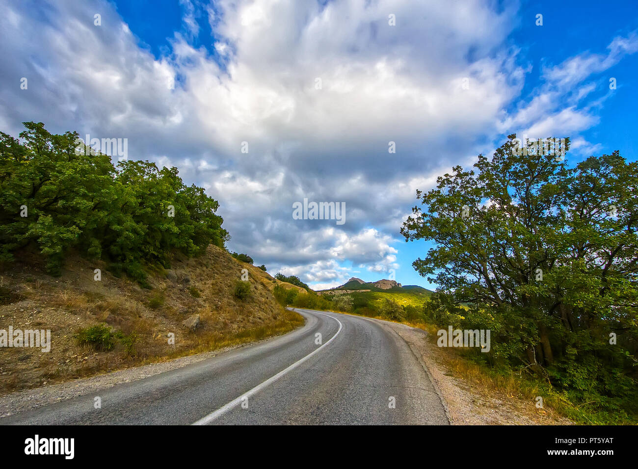 Beautiful Mountain Landscape with Winding Road Stock Photo