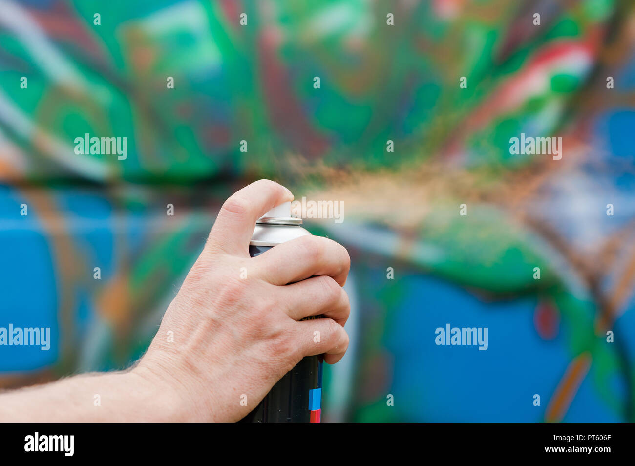 Hand holding spray paint can hi-res stock photography and images - Alamy