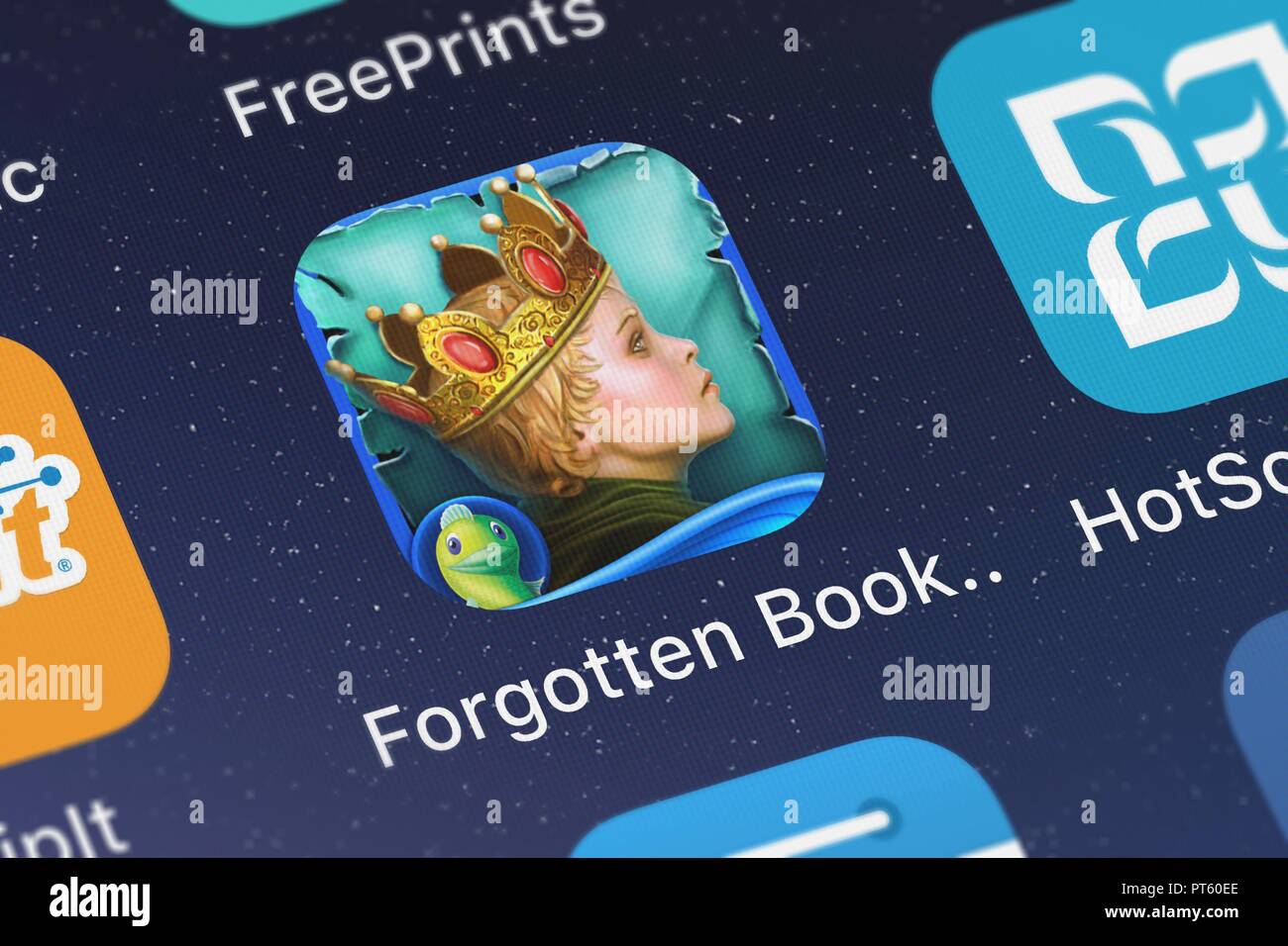 London, United Kingdom - October 06, 2018: The Forgotten Books: The Enchanted Crown HD - A Hidden Object Story Adventure mobile app from Big Fish Game Stock Photo
