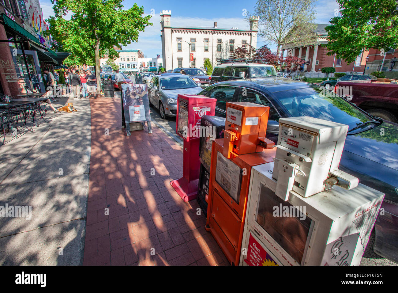 Newspaper boxes on Main Street in Northampton, MA Stock Photo