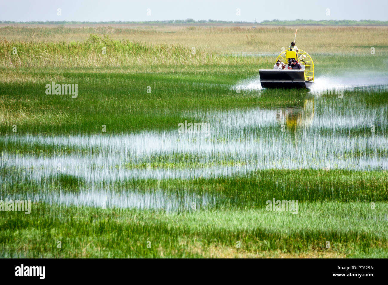 Miami Florida,Everglades National Park,airboat rider riders,Black Blacks African Africans ethnic minority,family families parent parents child childre Stock Photo