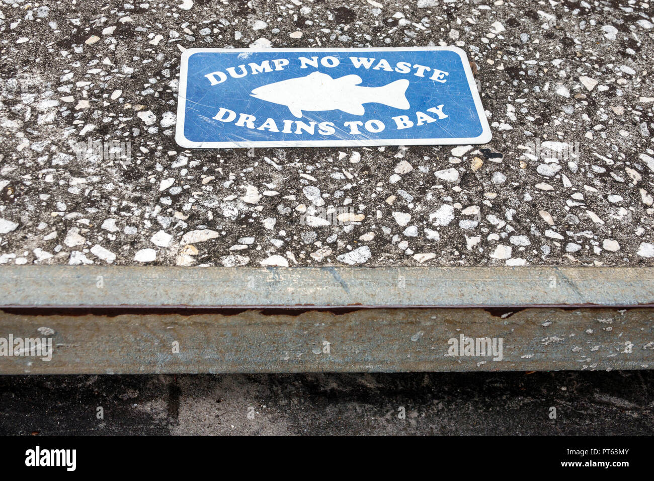 St. Saint Petersburg Florida,Central Avenue,sewer entrance,no dumping waste drains to bay,FL180731136 Stock Photo