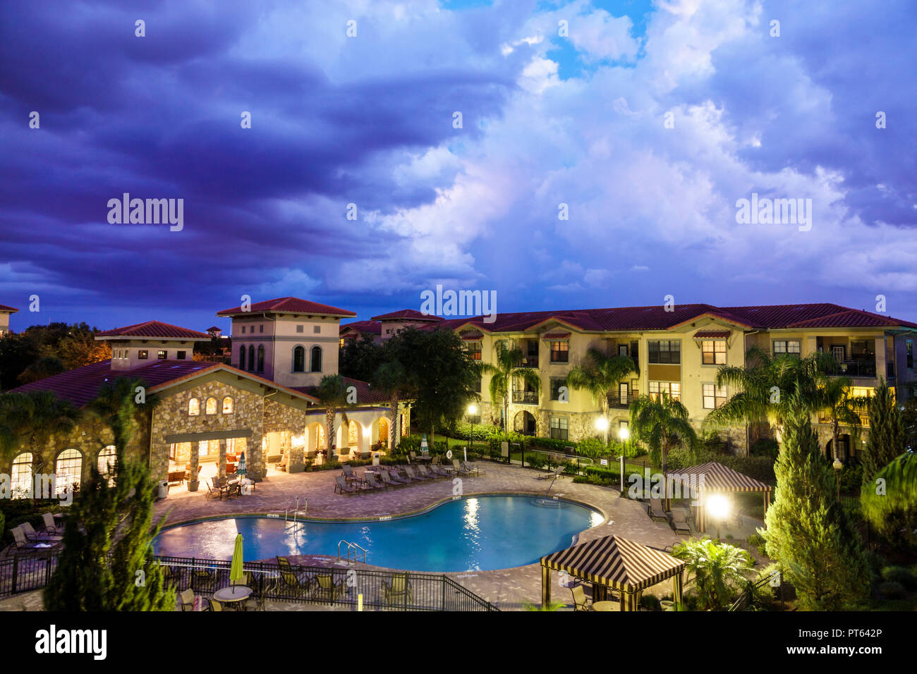 Florida,Davenport,Bella Piazza,rental condominiums,pool deck area,night evening dusk,dusk,FL180731220 Stock Photo