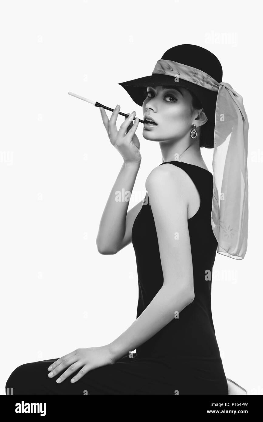 Audrey hepburn cigarette hi-res stock photography and images - Alamy