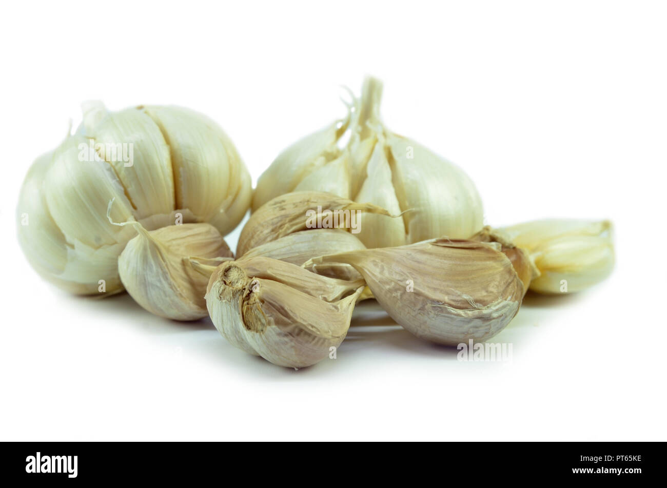 Isolated garlic and clove on white background Stock Photo - Alamy