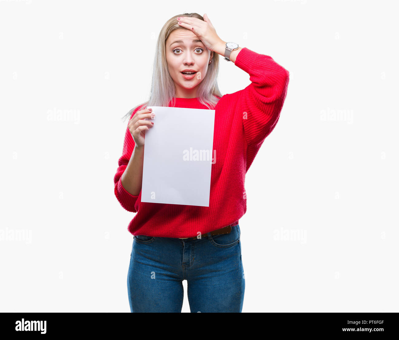 Young blonde woman holding blank paper sheet over isolated background