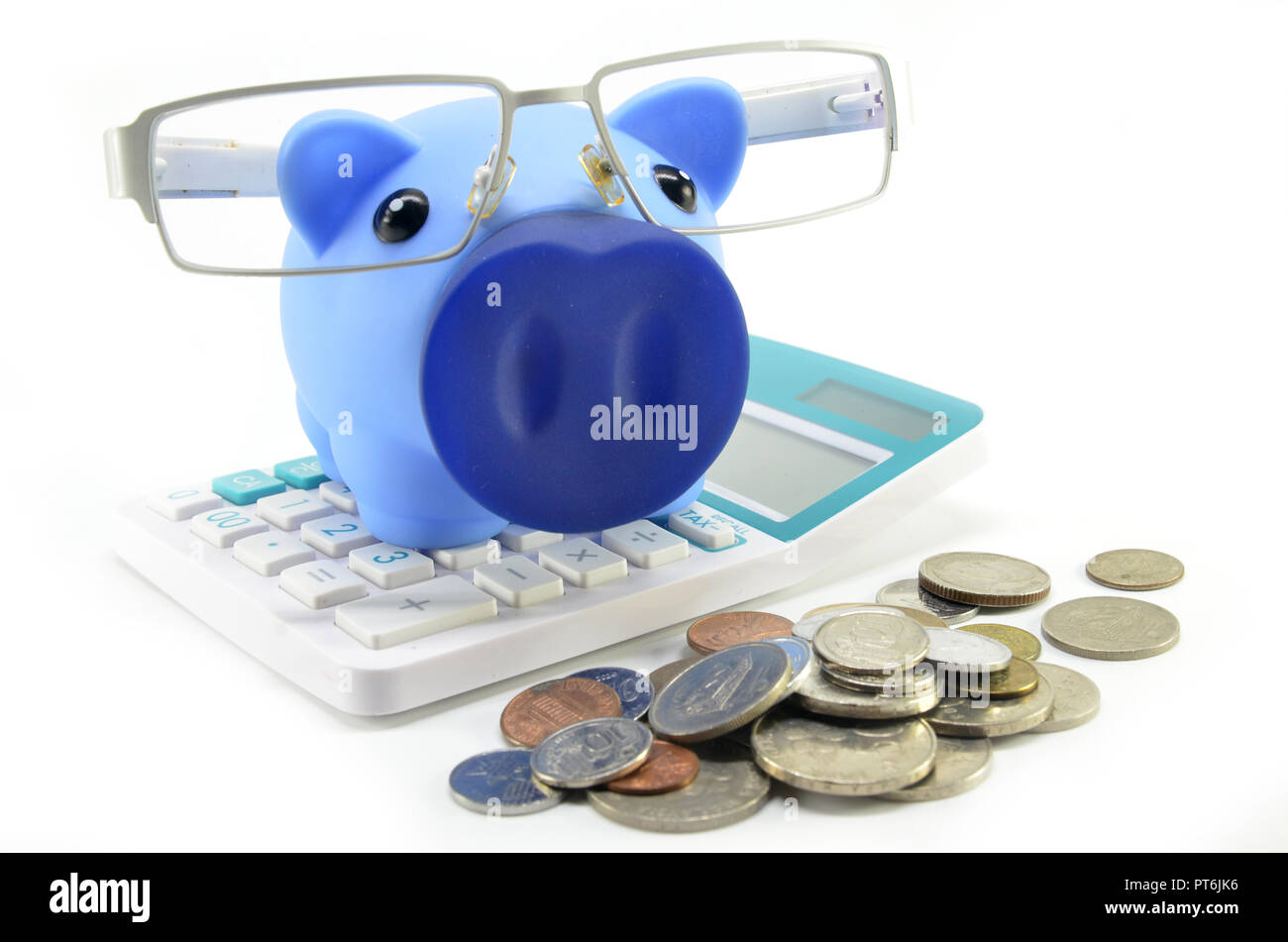 Blue piggybank with coins on a white background Stock Photo - Alamy