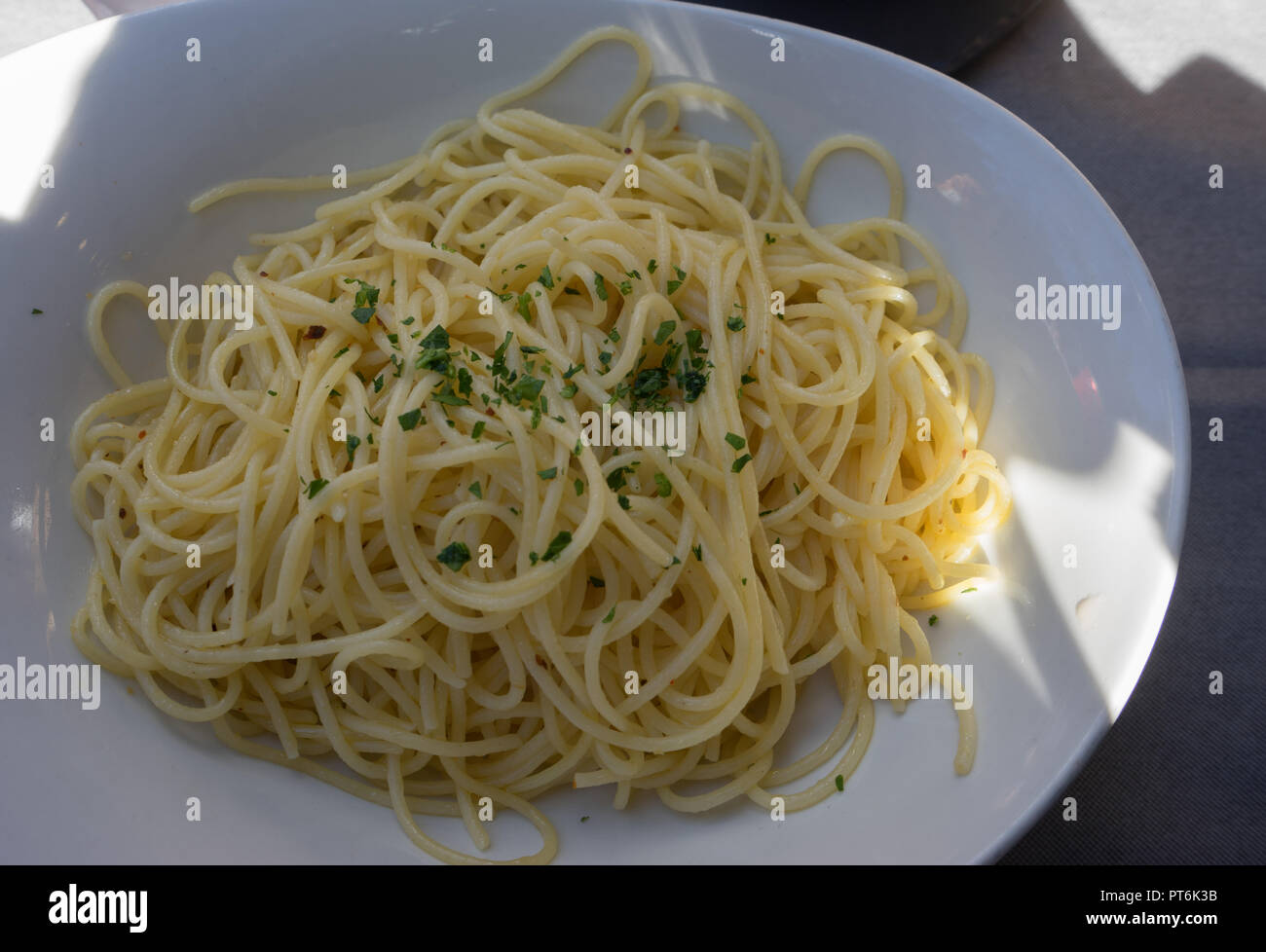 Europe, Italy, Bellagio, Lake Como, a bowl of pasta sits on a plate