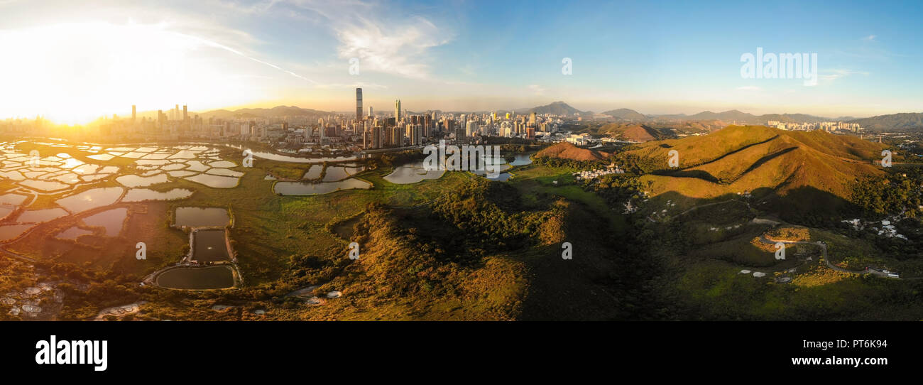 Skyline of Shenzhen City, China at twilight. Viewed from Hong Kong border Stock Photo