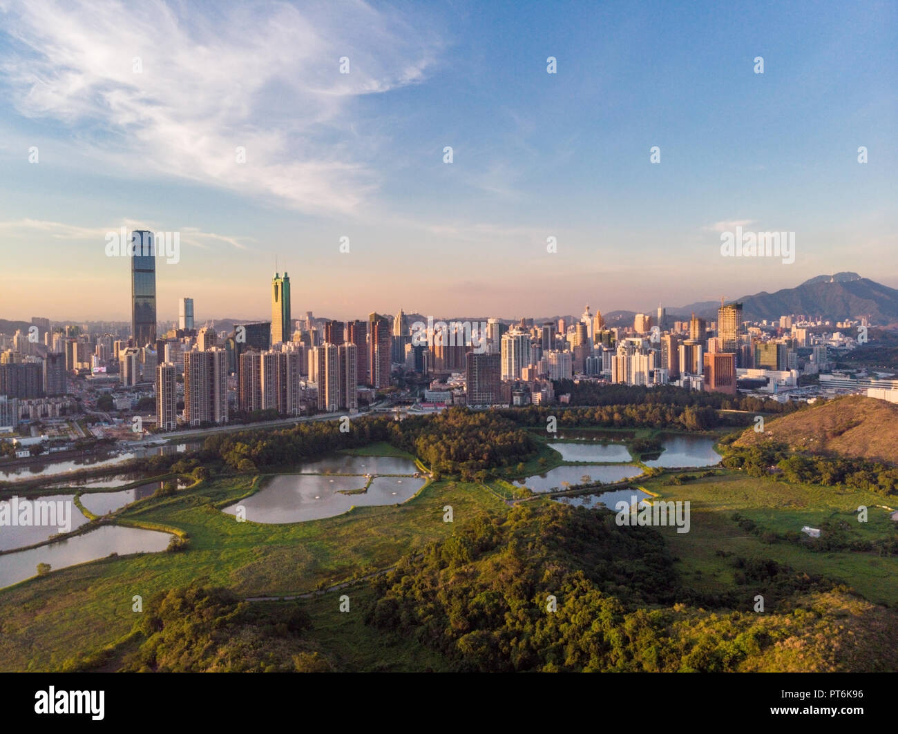 Skyline of Shenzhen City, China at twilight. Viewed from Hong Kong border Stock Photo