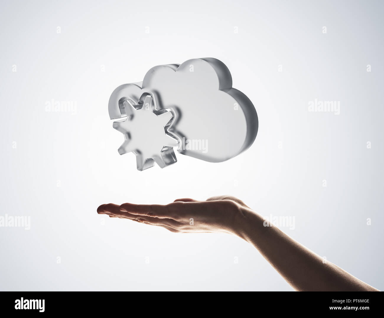 Cloud computing concept with glass symbol shown in hand Stock Photo