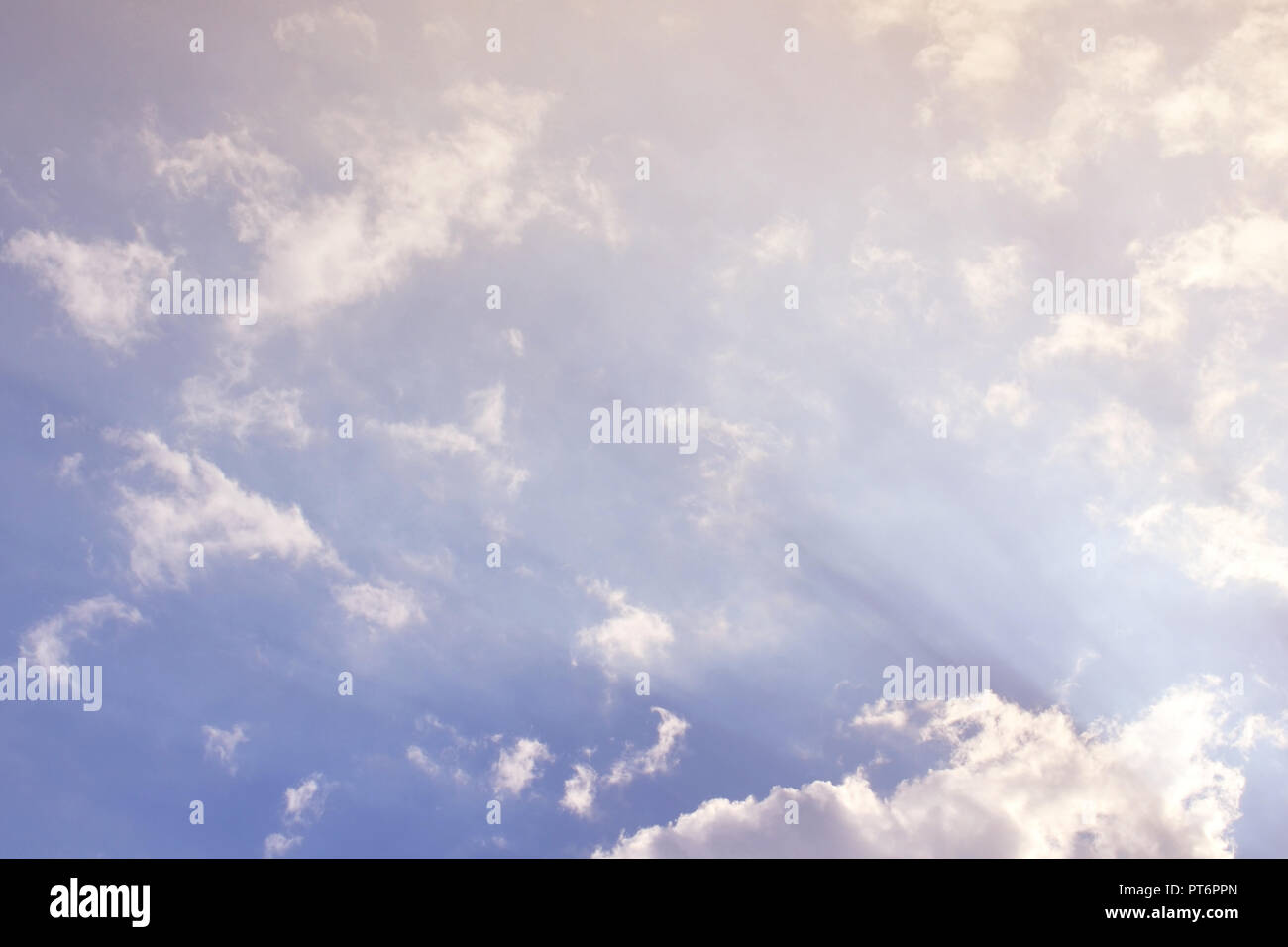 Nature background. Fluffy soft clouds in sky toned Stock Photo