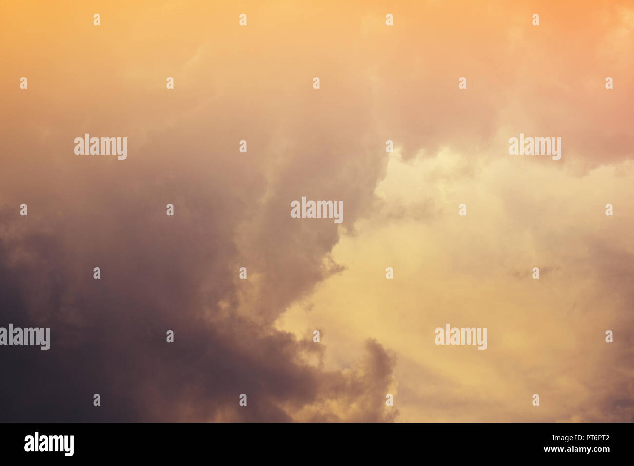 Nature background. Fluffy soft clouds in sky toned Stock Photo - Alamy