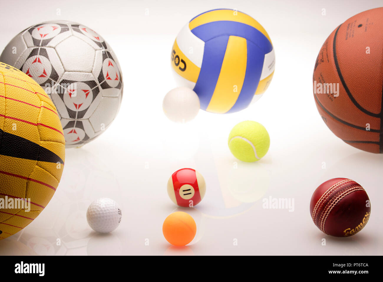 STILL LIFE OF ASSORTED BALLS OF VARIOUS SPORTS THROWBALL, VOLLEYBALL